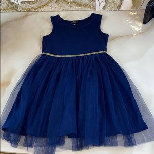 Blue dress with tutu skirt and gold belt